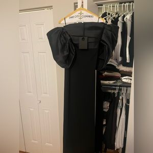 Never worn before - black Solace London dress, tags still on. US size 4